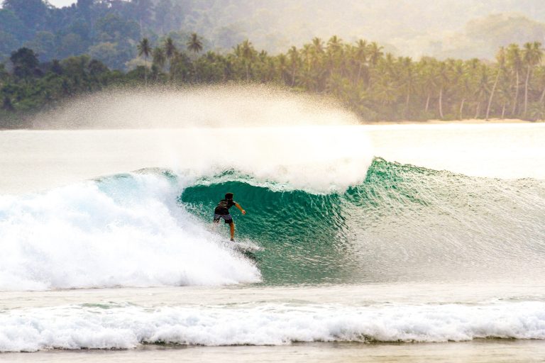 Surfing in Mentawai - Photo by James Donaldson on Unsplash